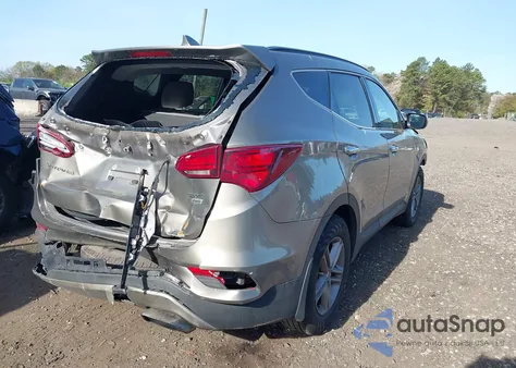 2018 Hyundai Santa Fe Sport 2.4L from USA, damaged, VIN 5NMZUDLB7JH077241